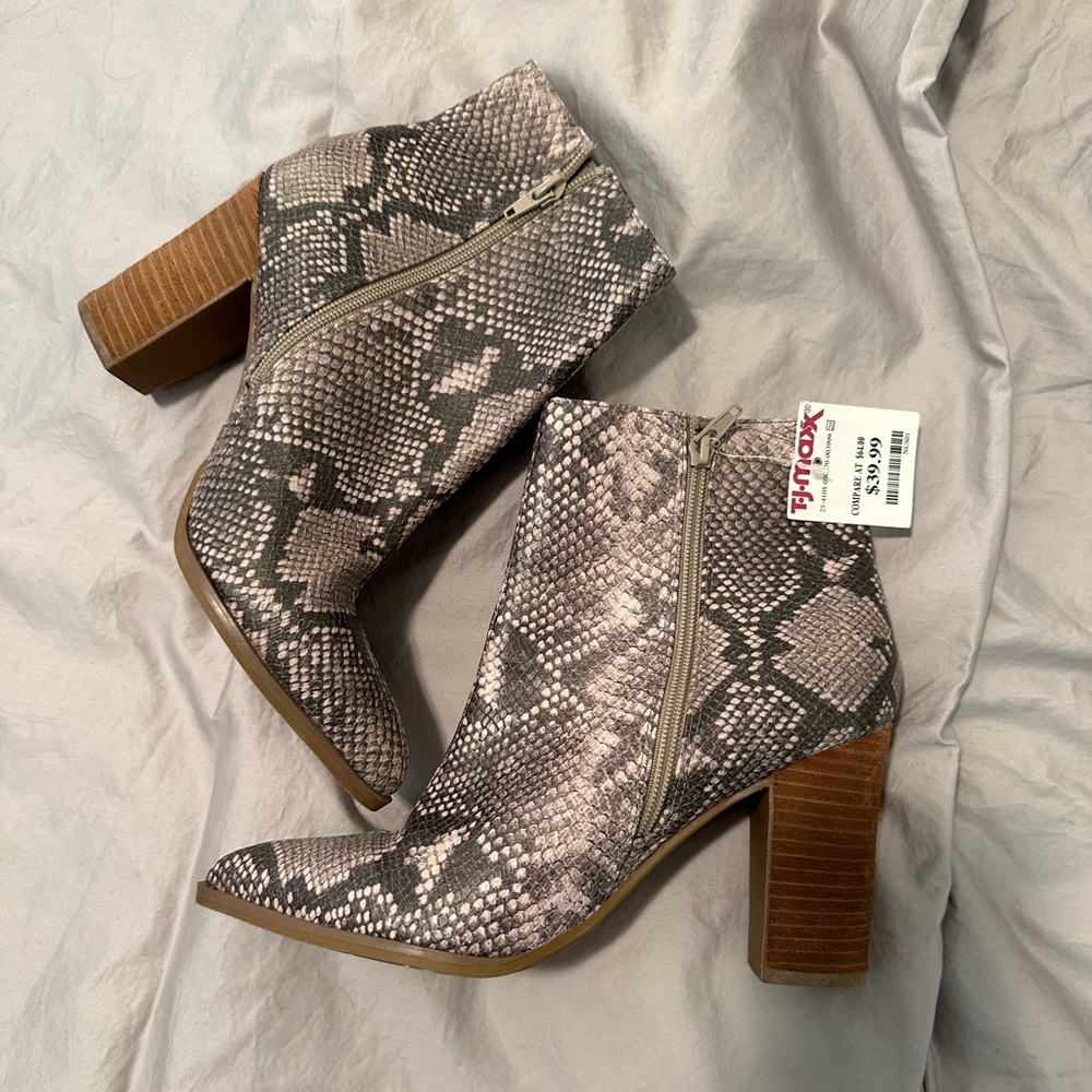 Snake skin heeled boots
